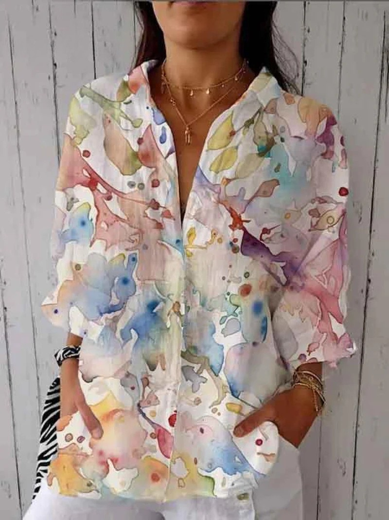 Blusa Rosa con Fiori Eleganti