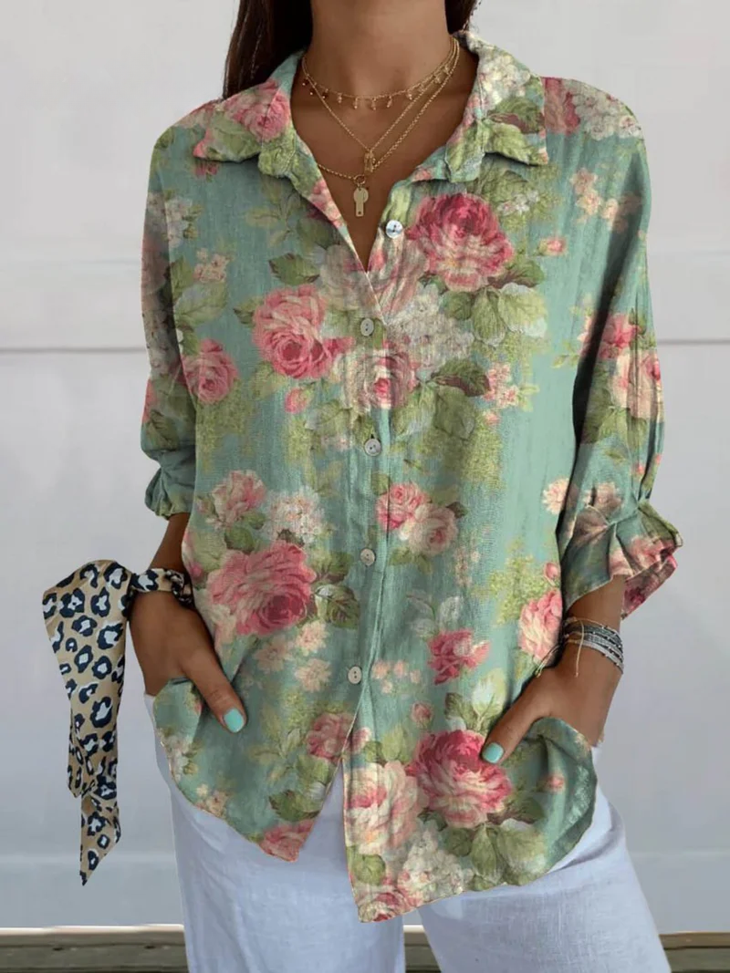 Blusa Rosa con Fiori Eleganti