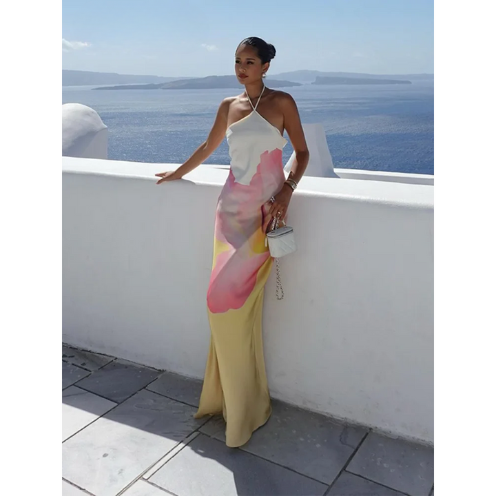 Ismena - Elegante maxi abito floreale con scollo obliquo
