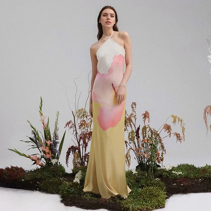 Ismena - Elegante maxi abito floreale con scollo obliquo