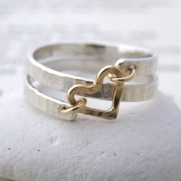  Melania - Anello Cuore Intrecciato