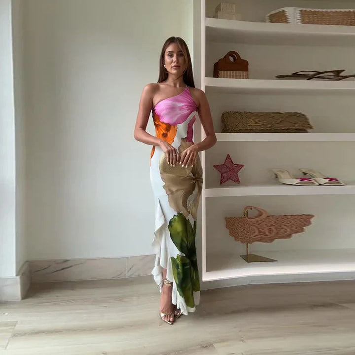 Ismena - Elegante maxi abito floreale con scollo obliquo